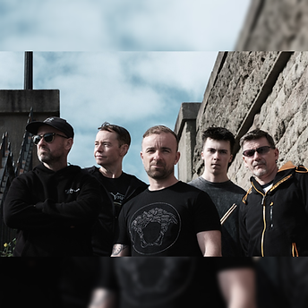 Independent artist roster band posing against a stone wall