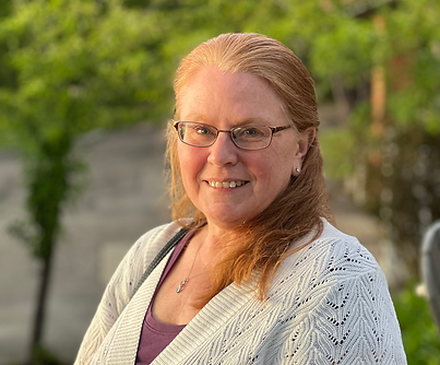 Portrait of lead breeder owner smiling at camera