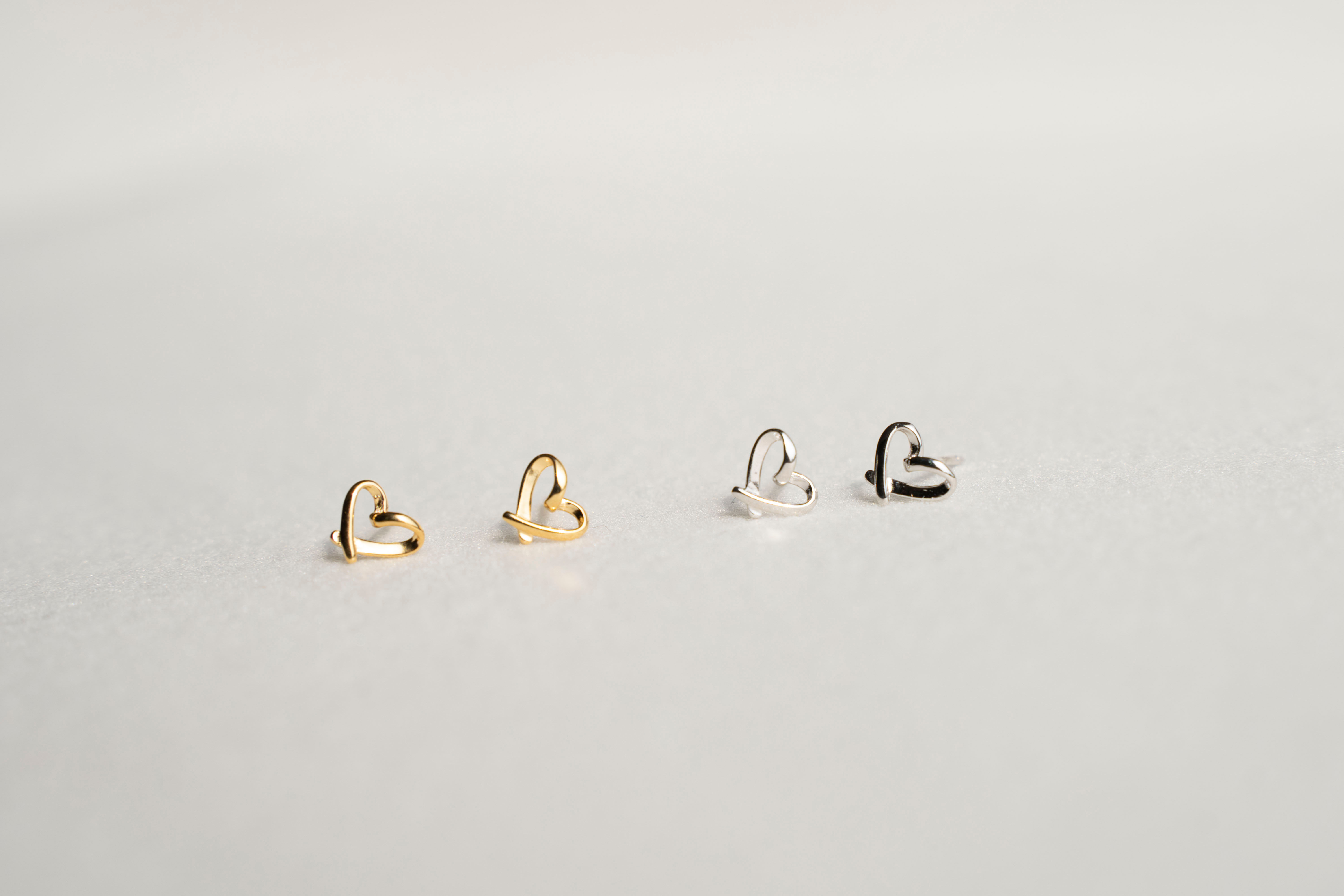Minimal Heart Stud Earrings in Sterling Silver