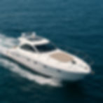 White luxury cruiser motorboat on open water