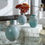 Thumbnail: Three Rustic Blue Green Glass Bottle Vases