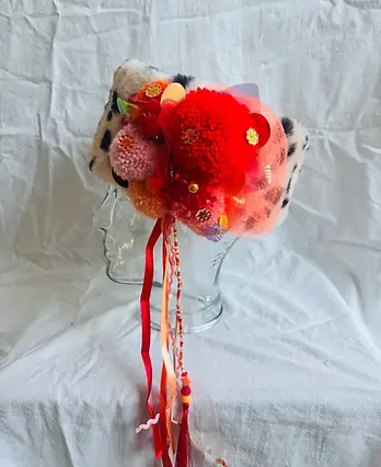 Hoofdband Bont dalmatiër rood-oranje pompons