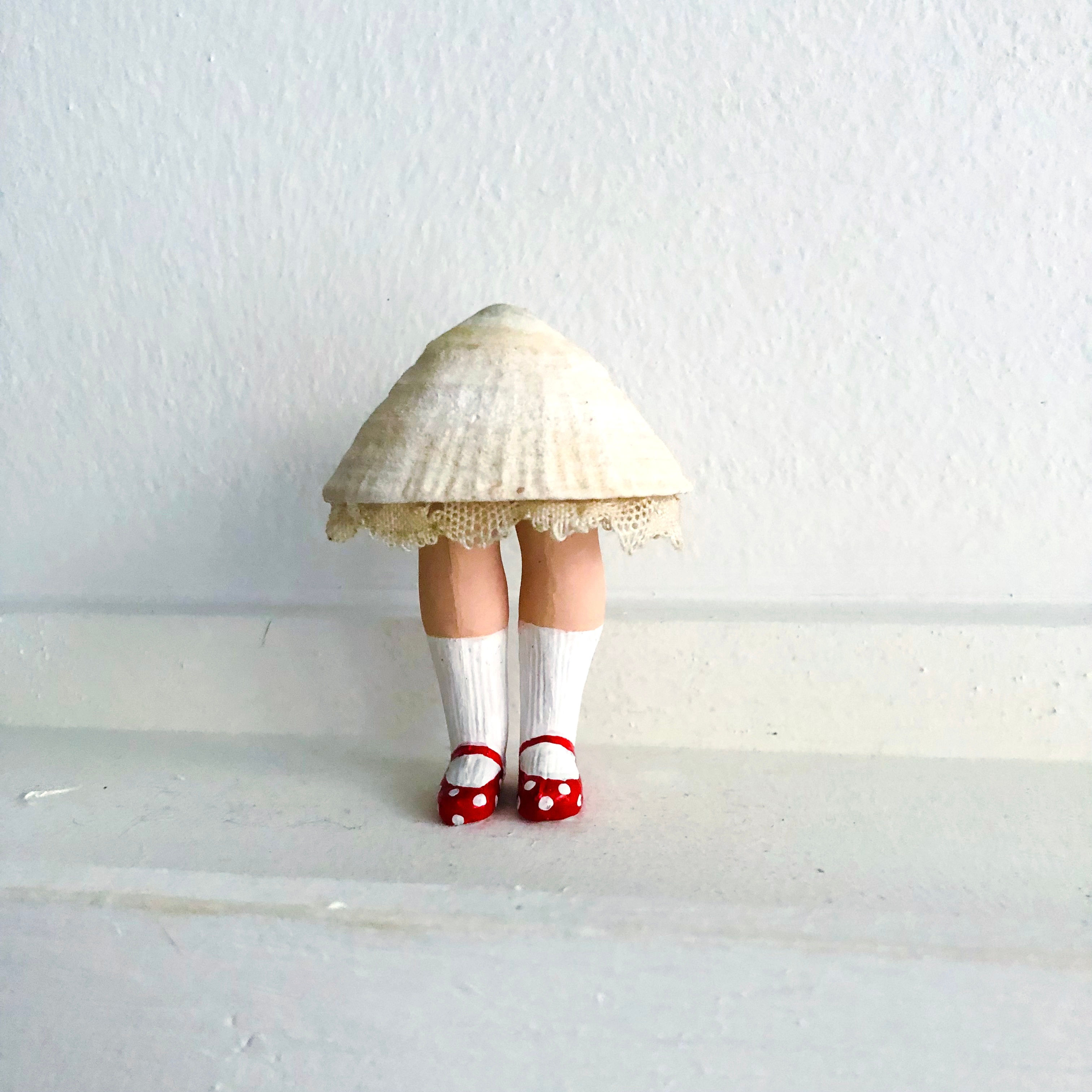 Miss bernique à chaussures à pois