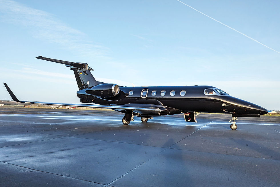 Sleek black private jet on a runway to book private flights france
