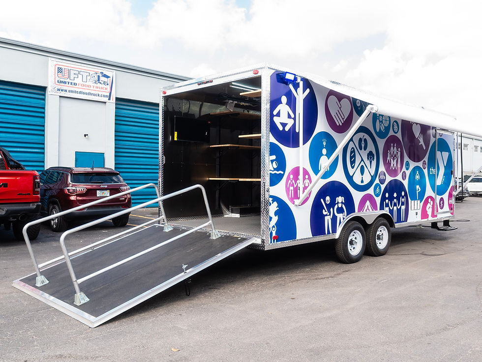 Custom 20FT Mobile Food Hub trailer built by United Food Truck for the YMCA of Ithaca, featuring a heavy-duty rear ramp with handrails and full custom vinyl wrap.