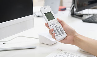 a-japanese-woman-holding-a-telephone-handset-2025-03-15-02-49-24-utc.jpg