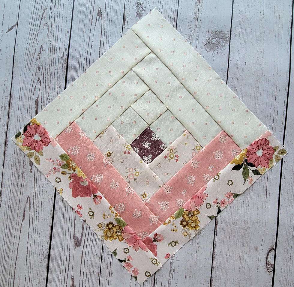 Thumbnail: The Quilted Boutique's Bold Bouquet A Pre-Cut Log Cabin quilt Kit