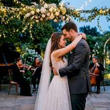 Bride and groom dancing to live wedding music