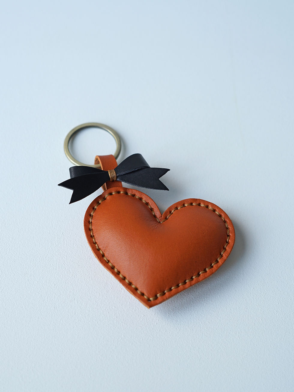 Thumbnail: Heart Shaped Keychain With Bow Tie Detail