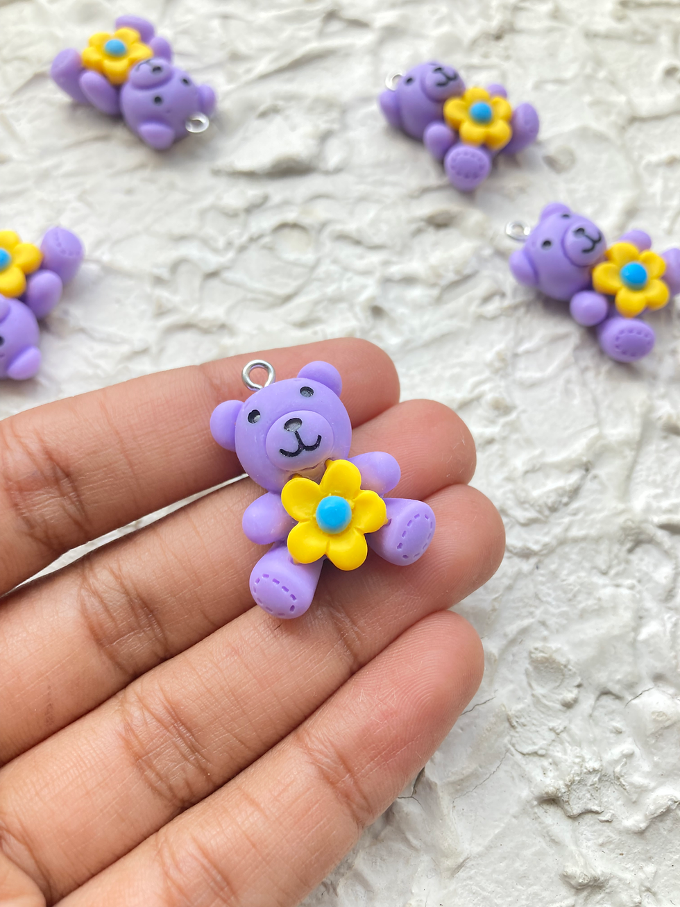 Thumbnail: Resin bear with flower charm