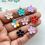 Thumbnail: Multi-colour 5 petal enamel flower charm