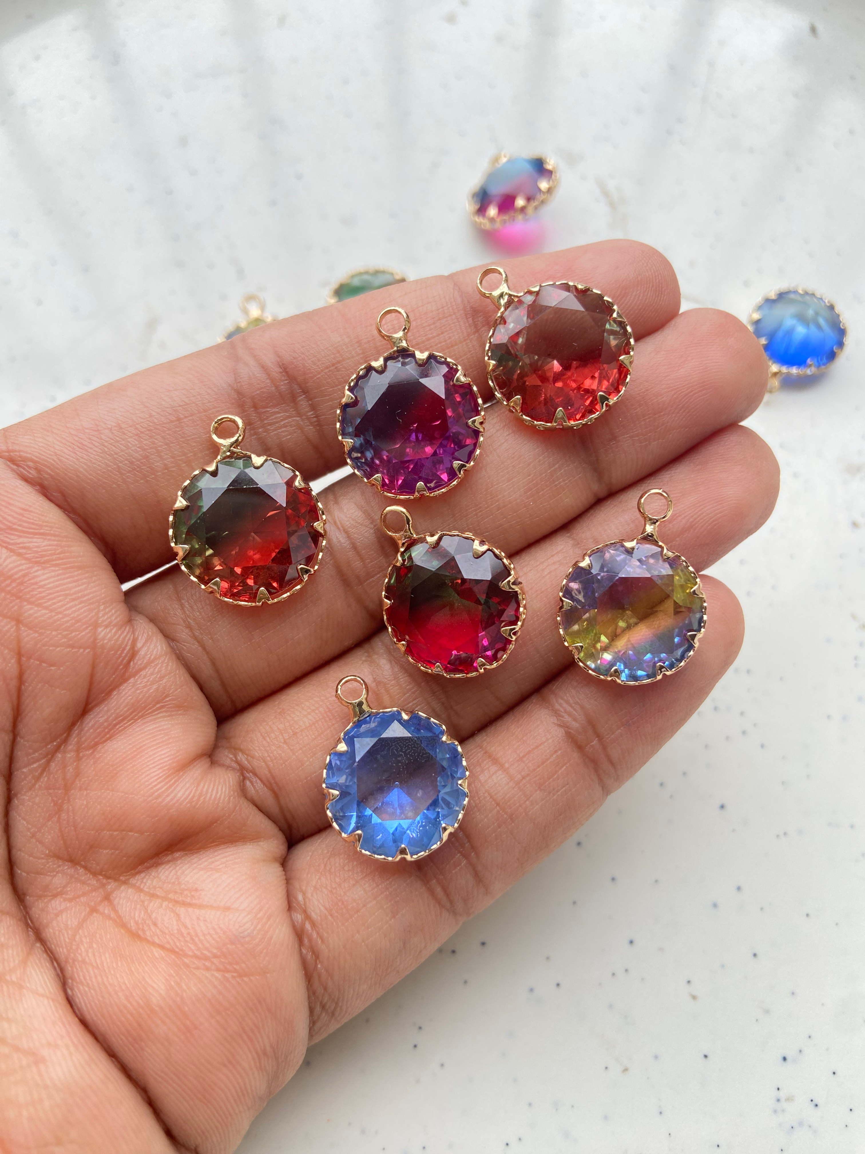 Two tone faceted glass round charm