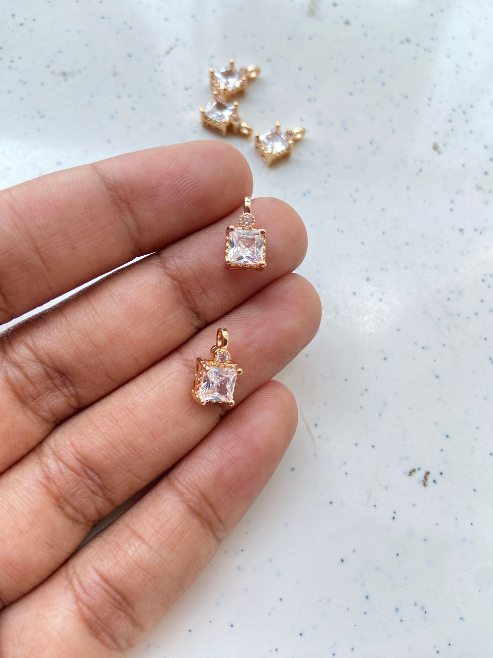 Thumbnail: Square shape with daimond stone on top charm
