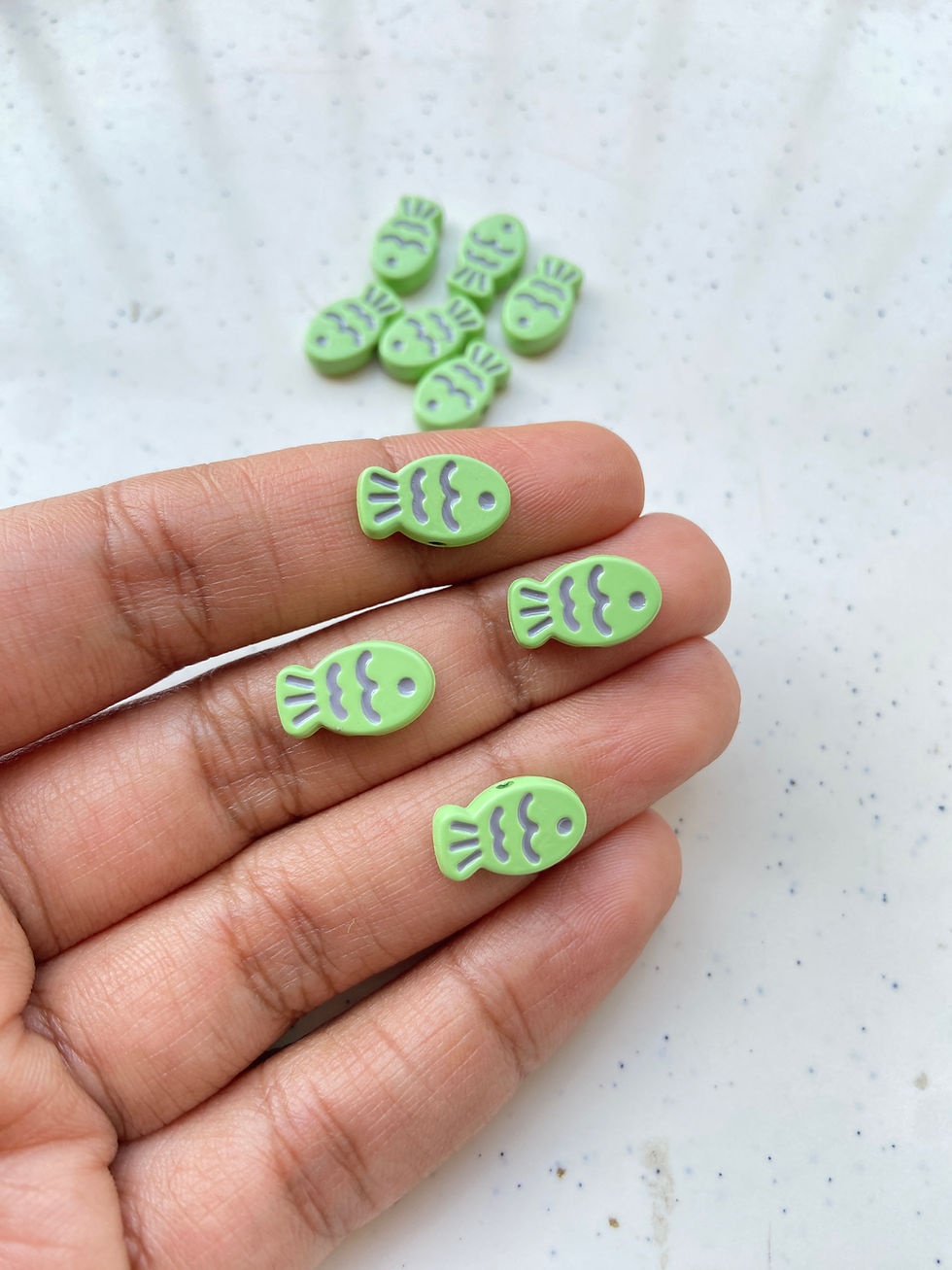 Thumbnail: Spray painted alloy enamel fish bead, vertically drilled