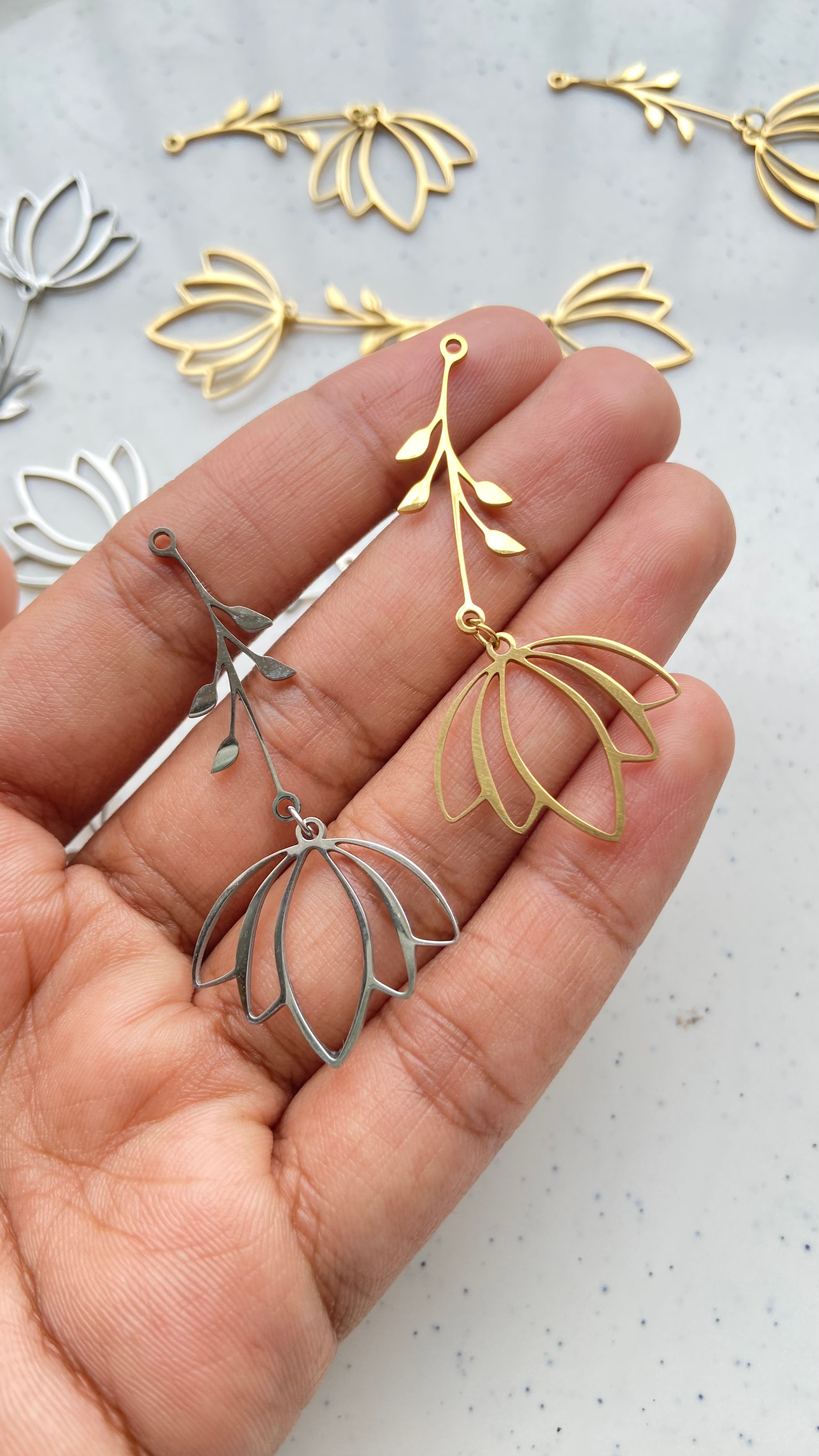 Stainless steel lotus with branch charm