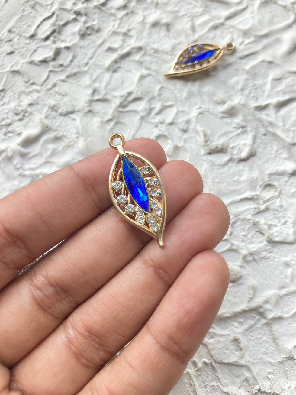 Thumbnail: Gold plated rhinestone leaf charm