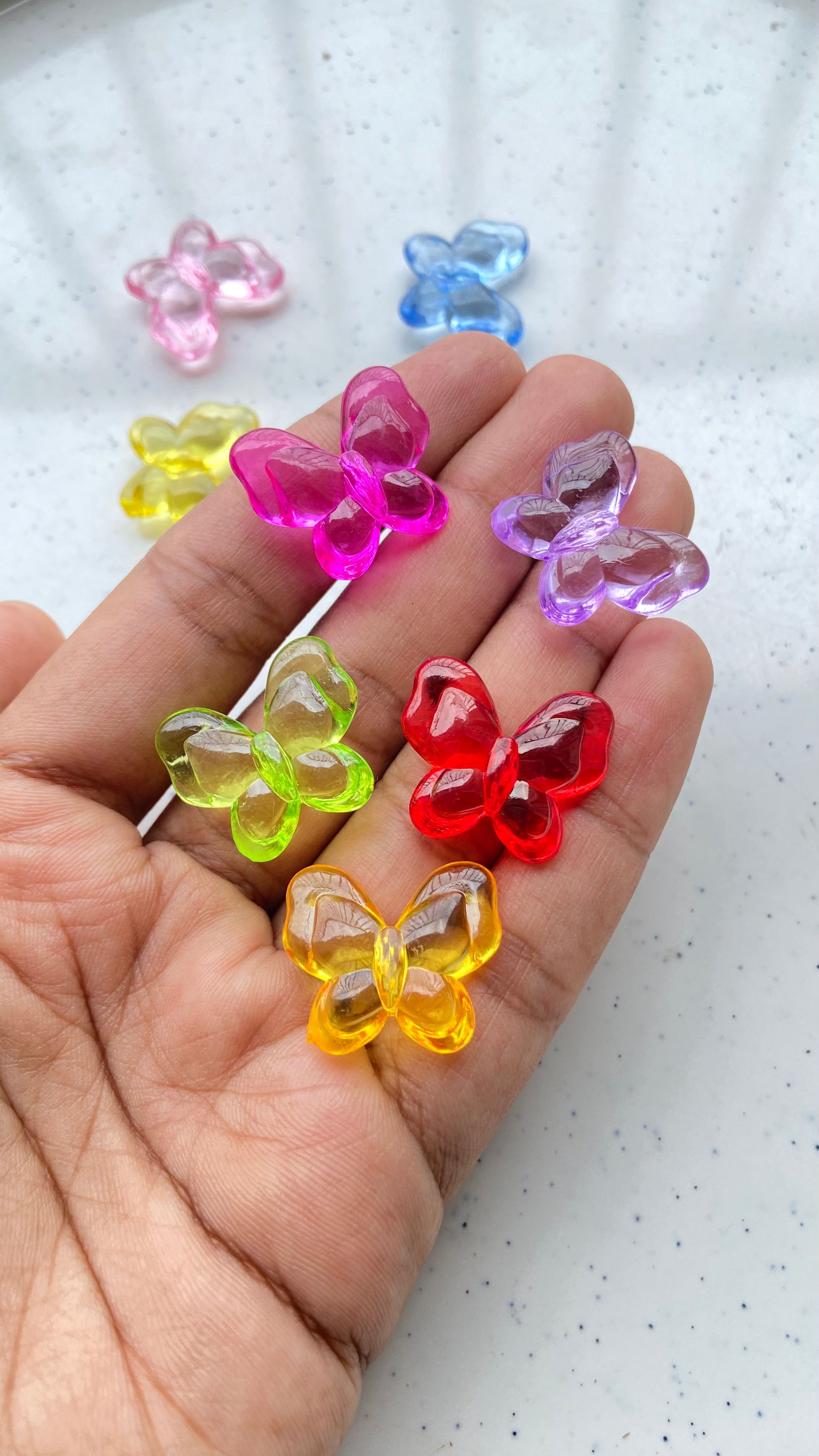 Transparent acrylic butterfly vertically drilled bead