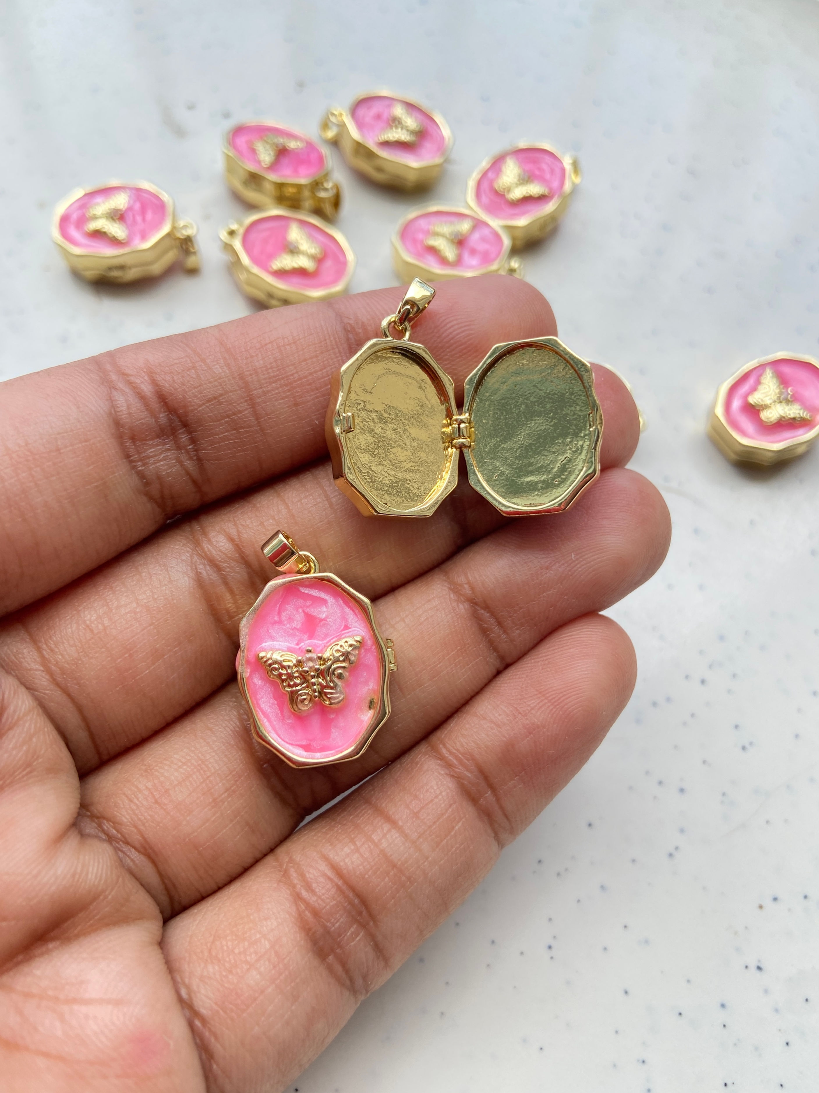 Oval butterfly with enamel locket charm