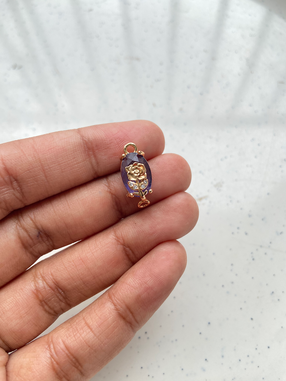Thumbnail: Oval shape with rose print connector