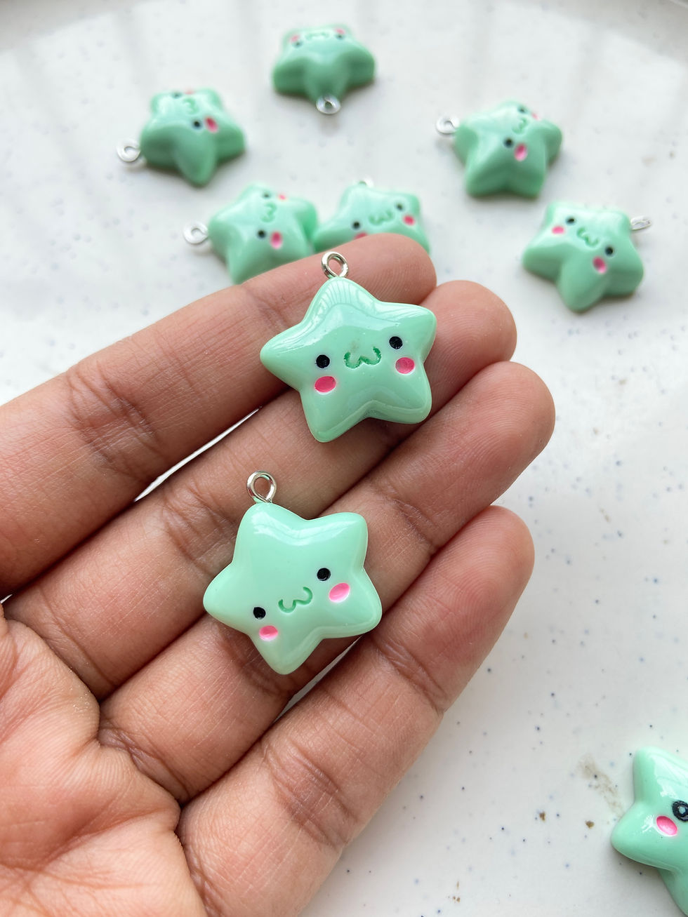 Thumbnail: Colourful star with blush face resin charm