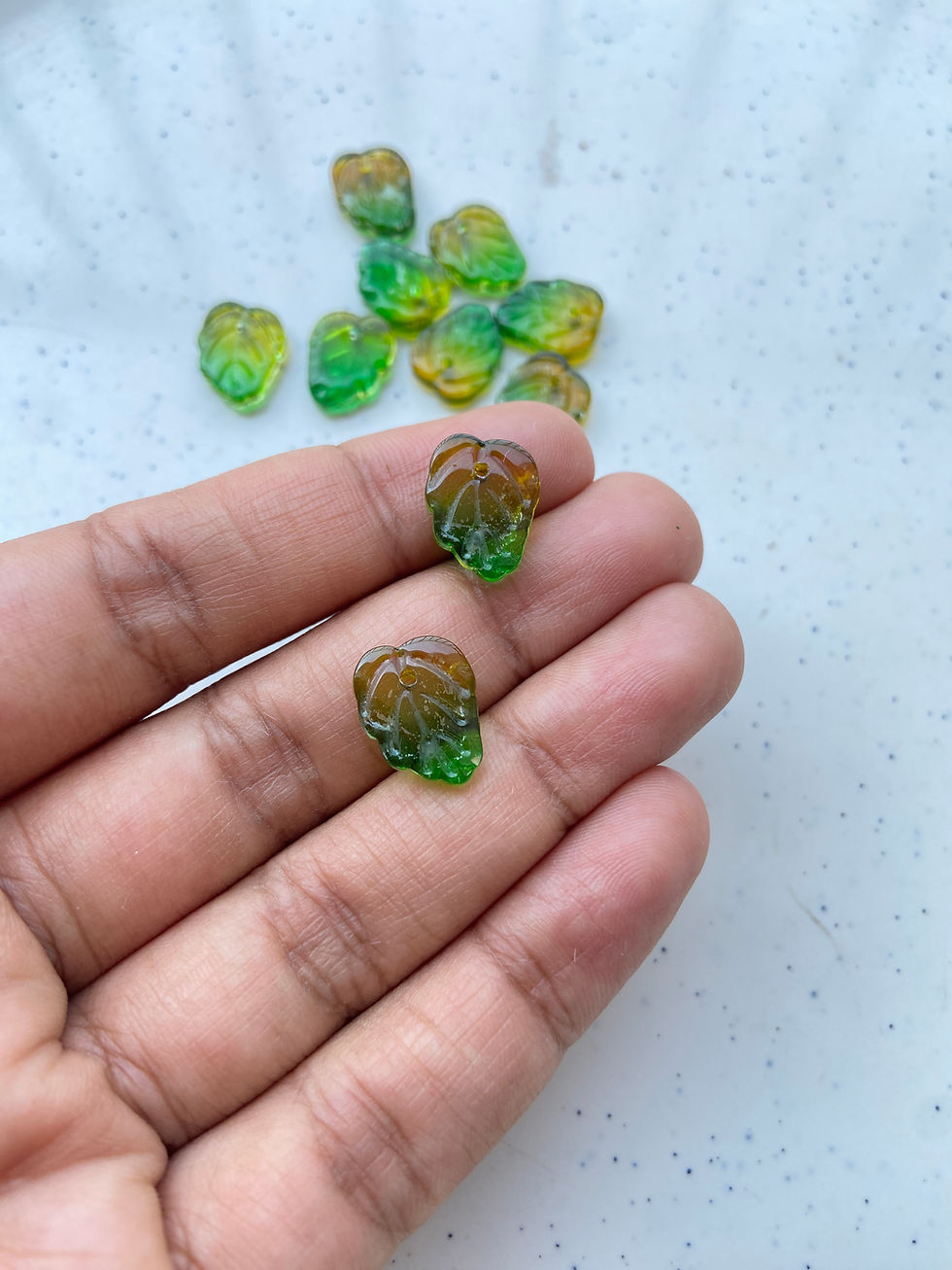Thumbnail: Lightly shaded glass leaf charm