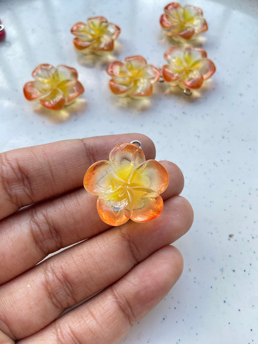 Thumbnail: Transparent frangipani flower resin charm