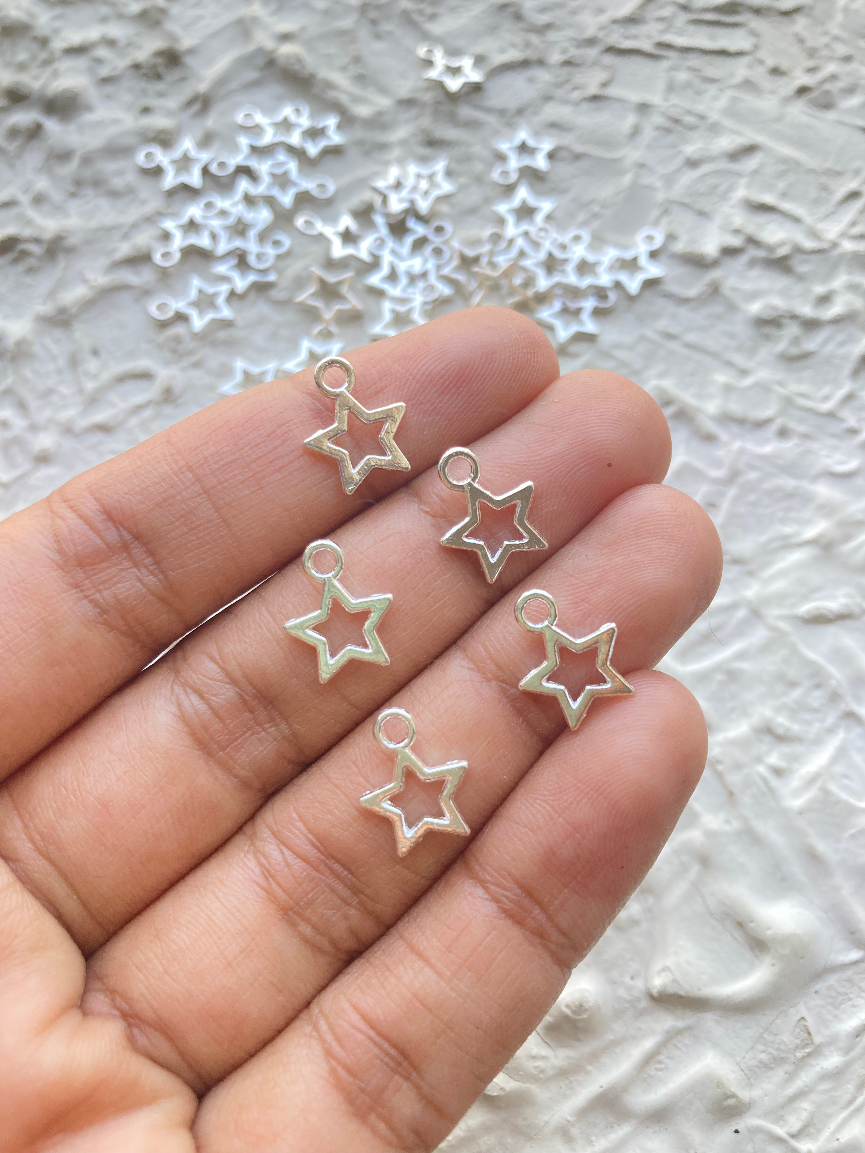 Alloy star charm