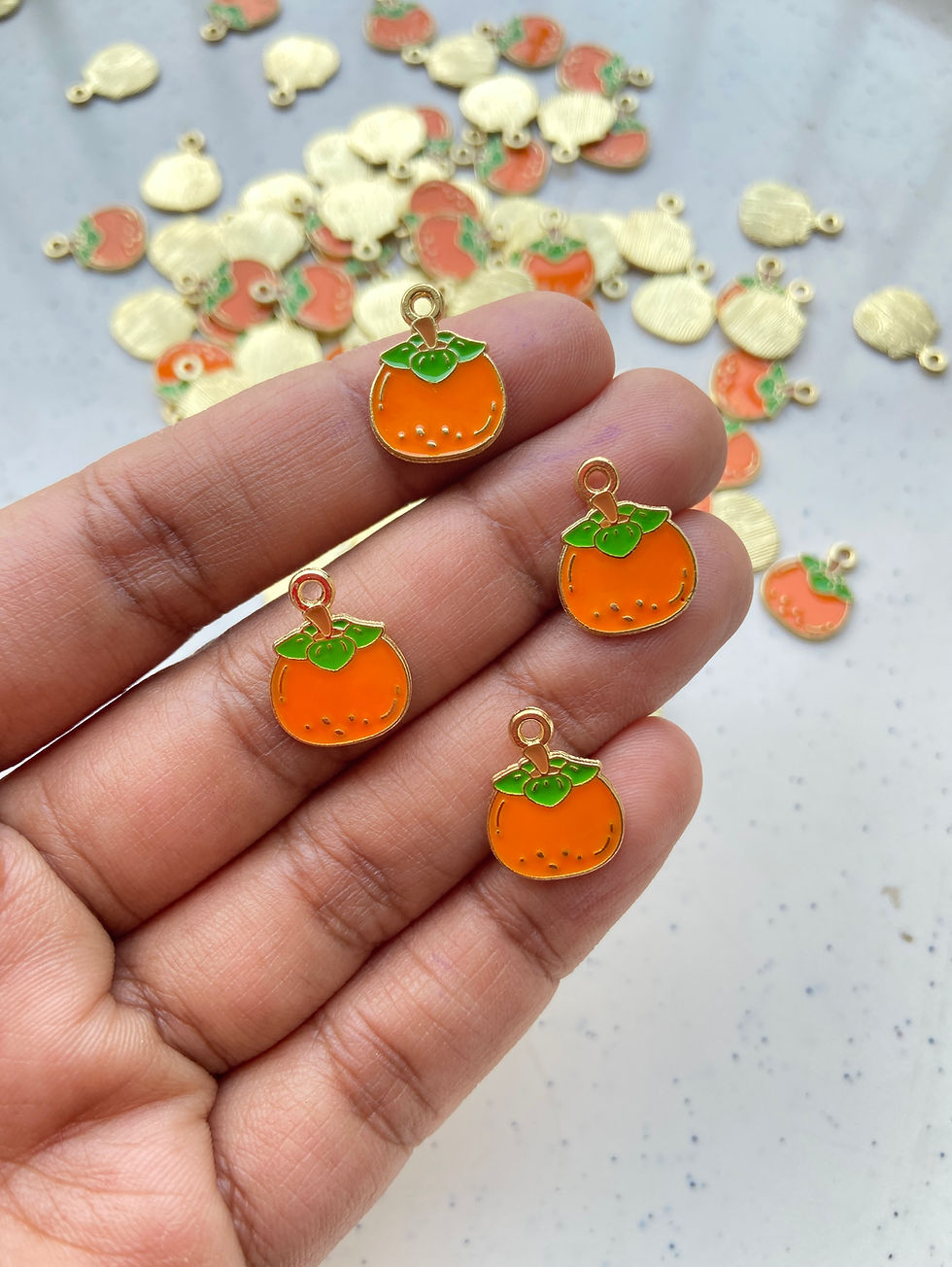 Thumbnail: Enamel orange alloy charm