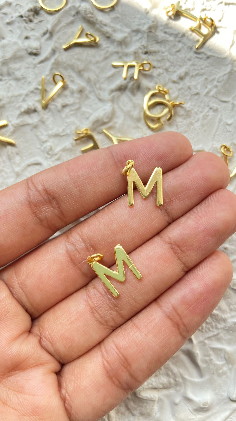 Thumbnail: Alphabet charms B to M
