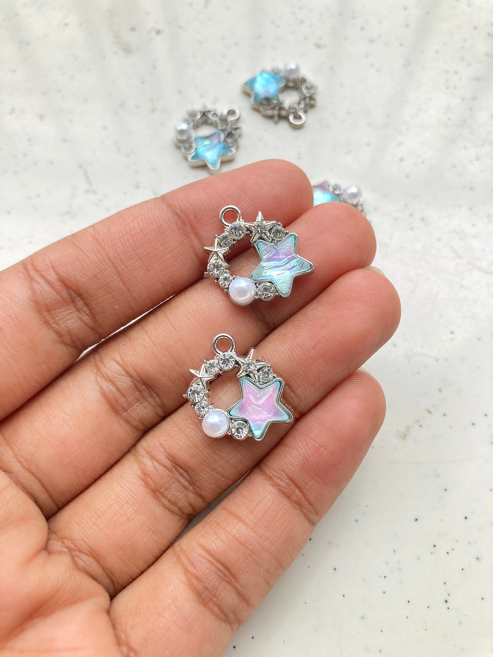Thumbnail: Silver circle with stone and star charm