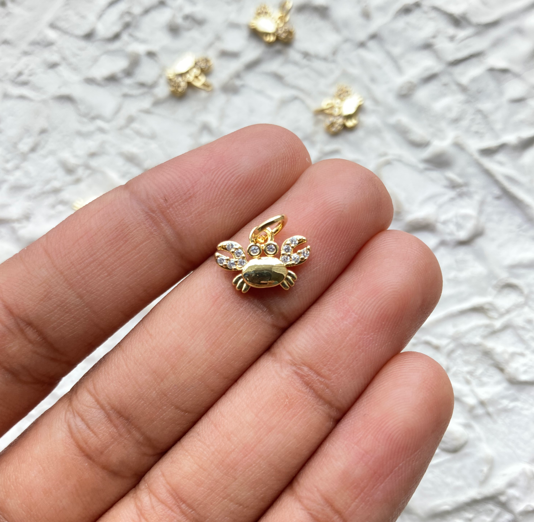 Clear zircon crab charm