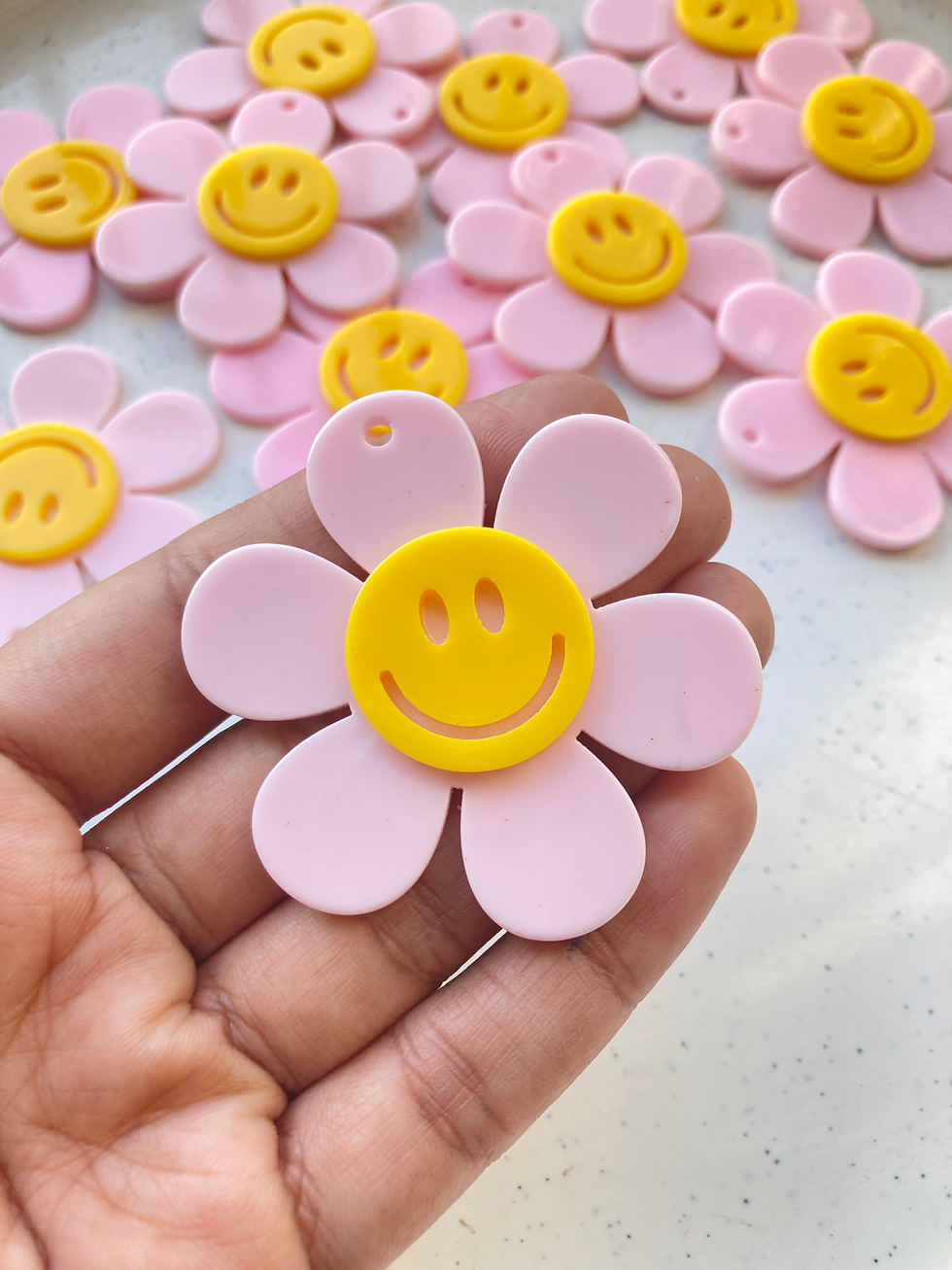 Thumbnail: Big acrylic flower with smiley shape charm