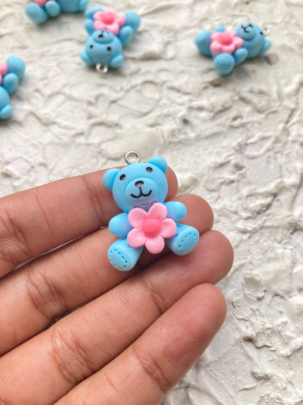 Thumbnail: Resin bear with flower charm