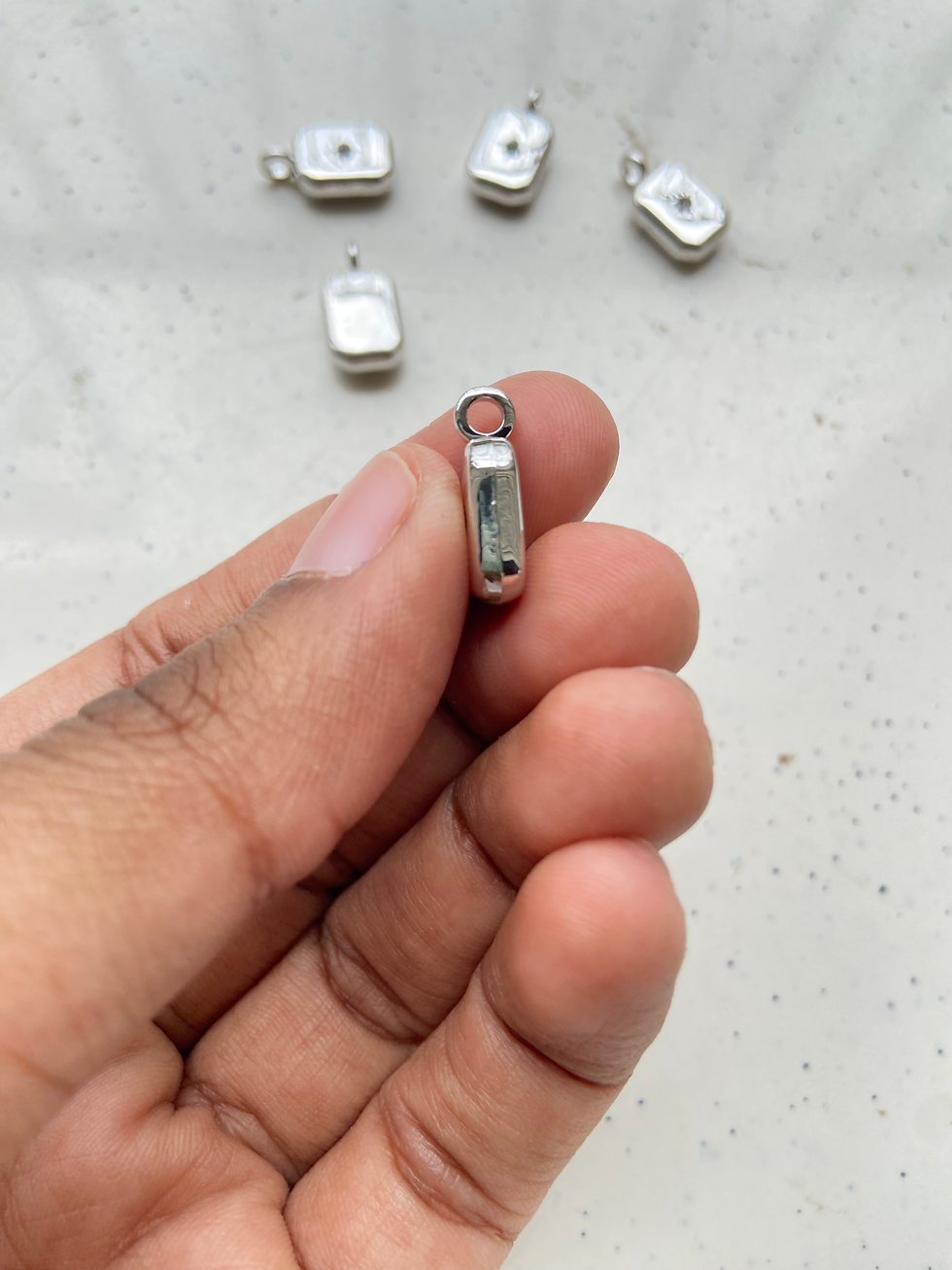 Thumbnail: Rectangle silver alloy with rhinestone in middle charm