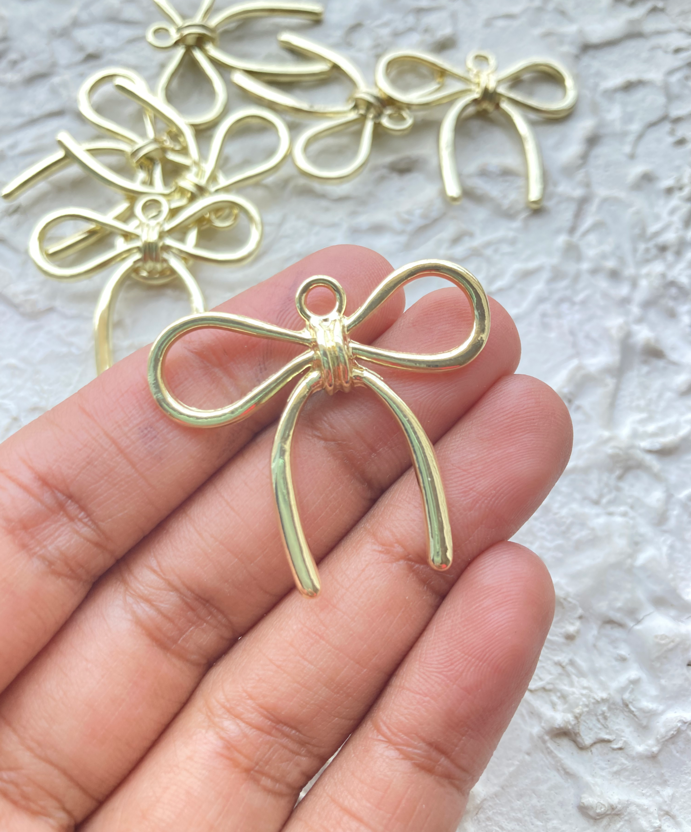 Big alloy bow knot charm