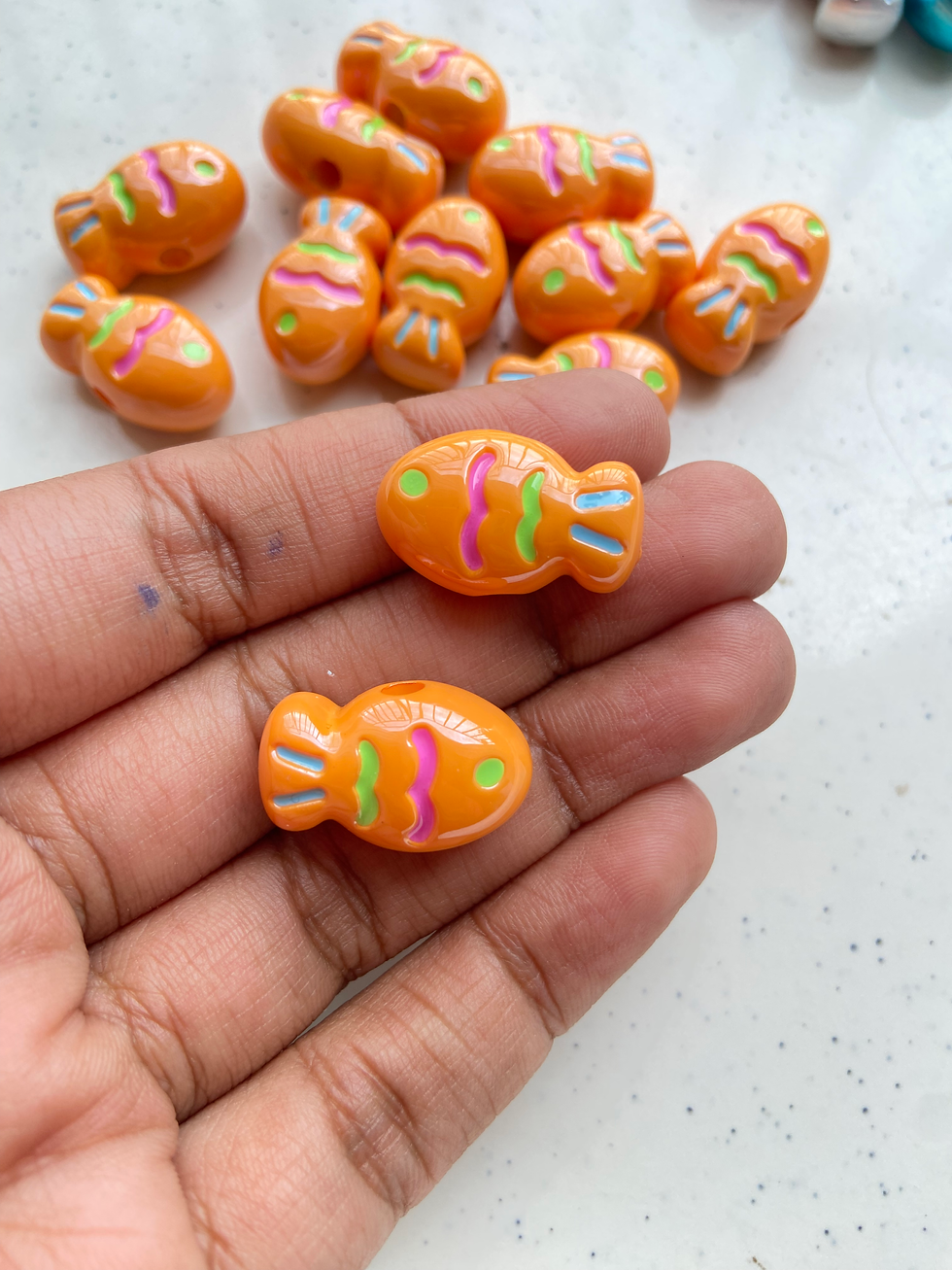 Thumbnail: Shiny acrylic fish bead, side drilled