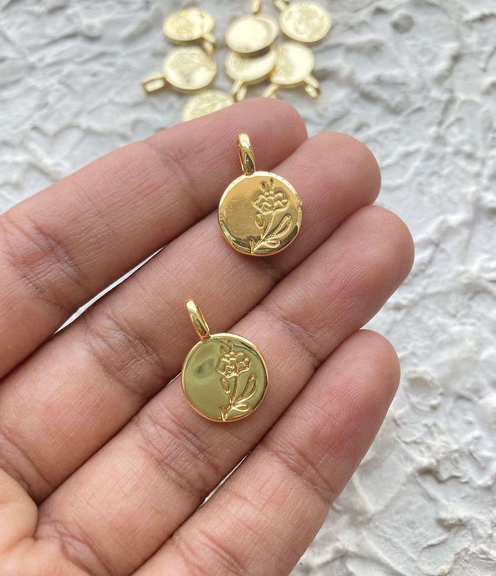 Thumbnail: Flat round with flower impression charm