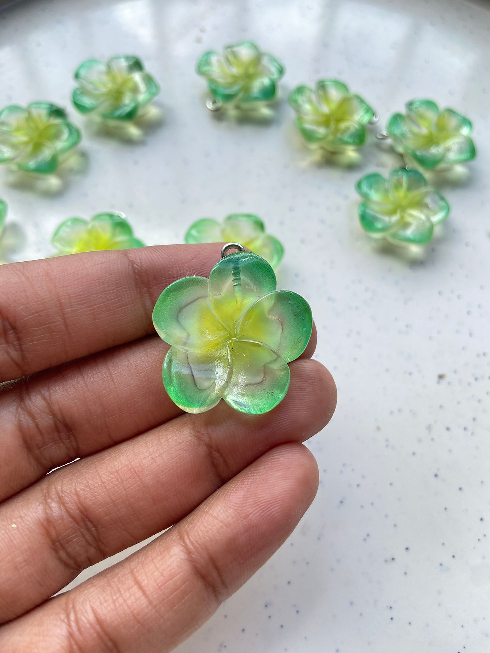 Thumbnail: Transparent frangipani flower resin charm