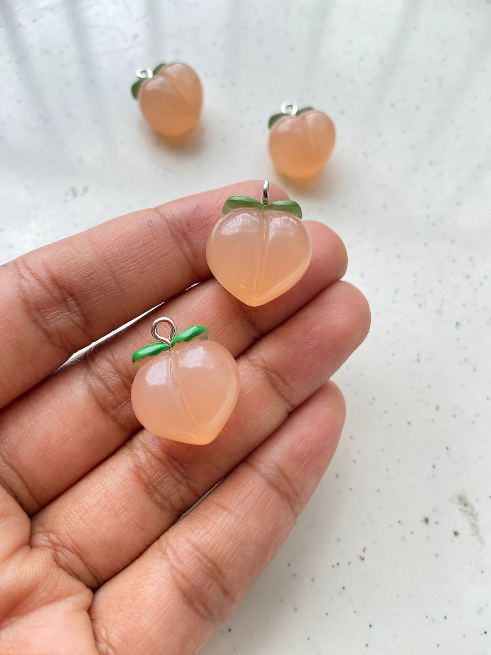 Thumbnail: Peach resin charm