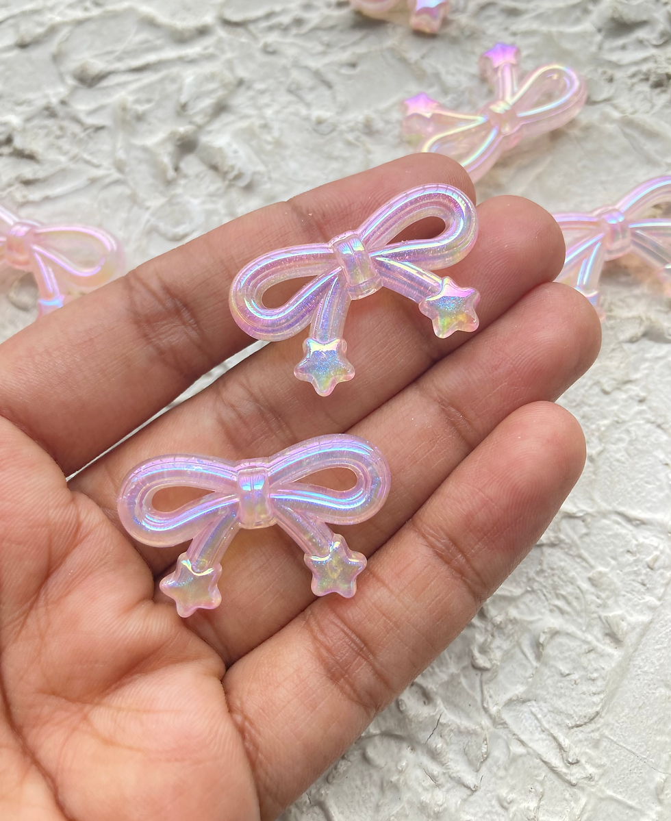 Thumbnail: Shiny bow with star acrylic bead, vertically drilled