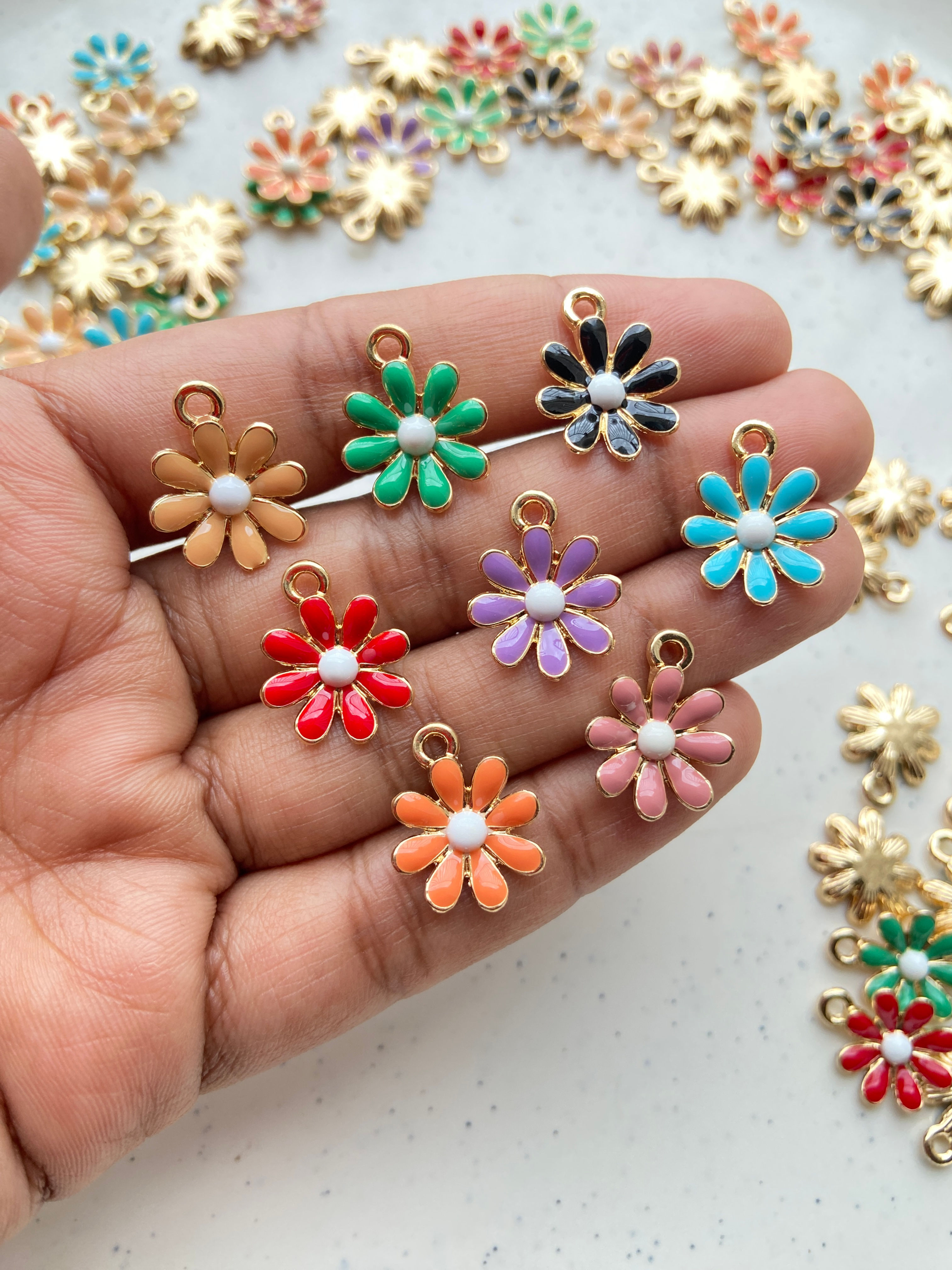 Gold plated enamel daisy flower charm