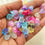 Thumbnail: Acrylic bell shape flower bead cap set (100pcs), center drilled