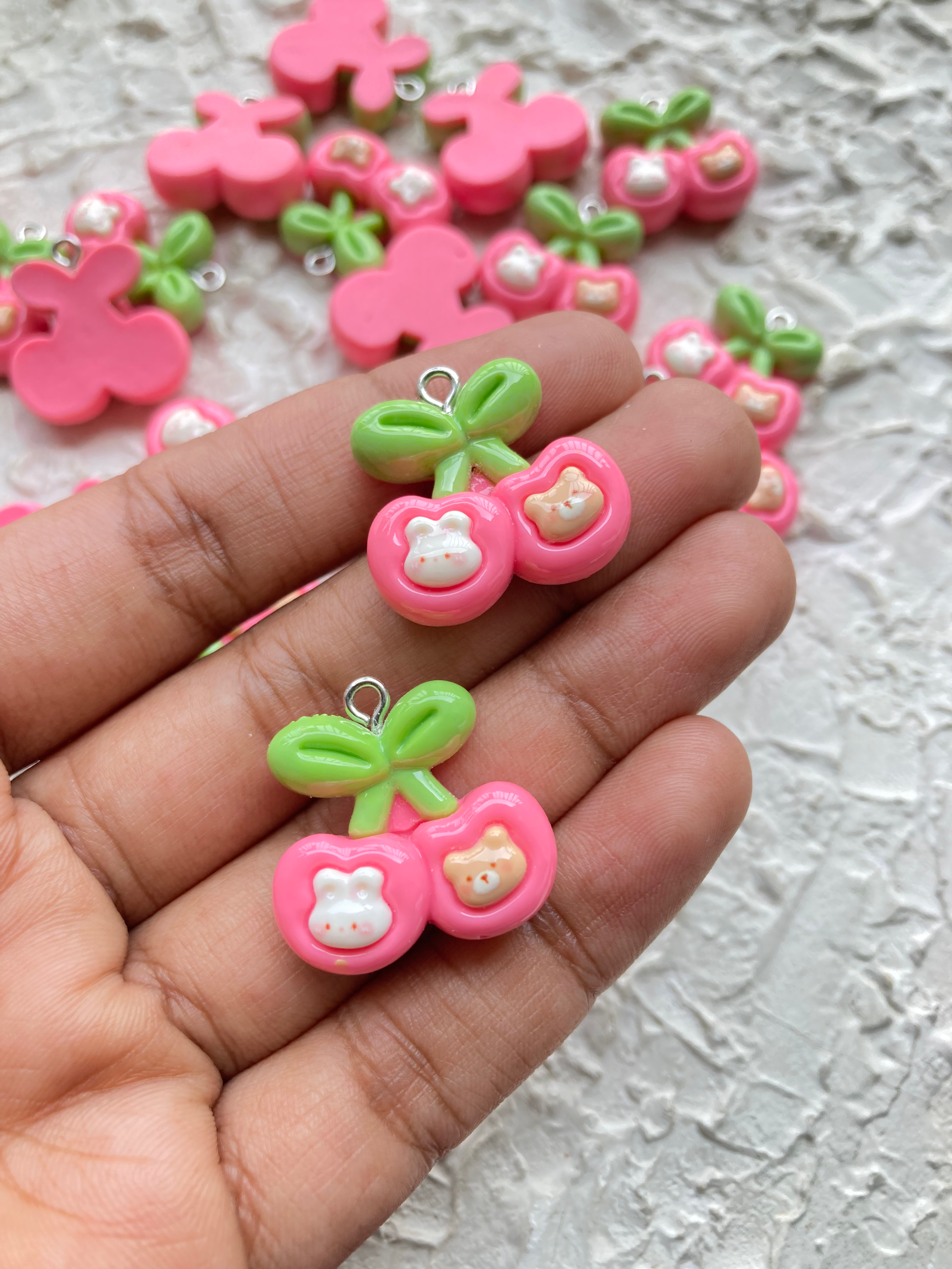 Cherry shape with two bear face resin charm