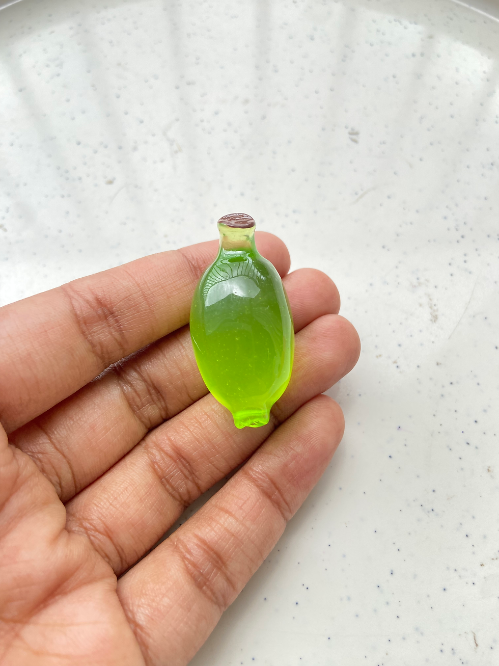 Thumbnail: Banana resin fruit cabachon charm (no hook, no drill)