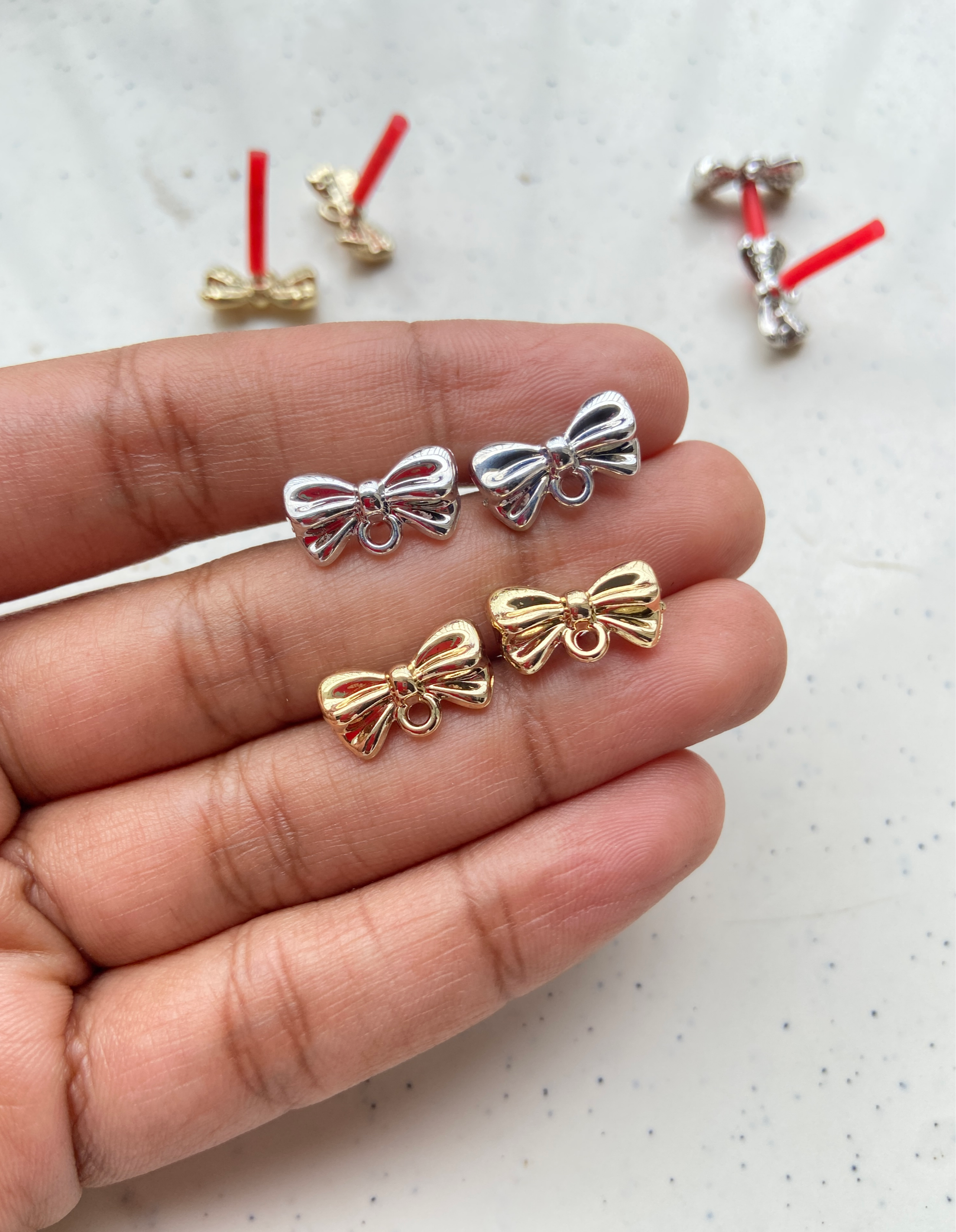 Silver/golden alloy bow stud (1pair)