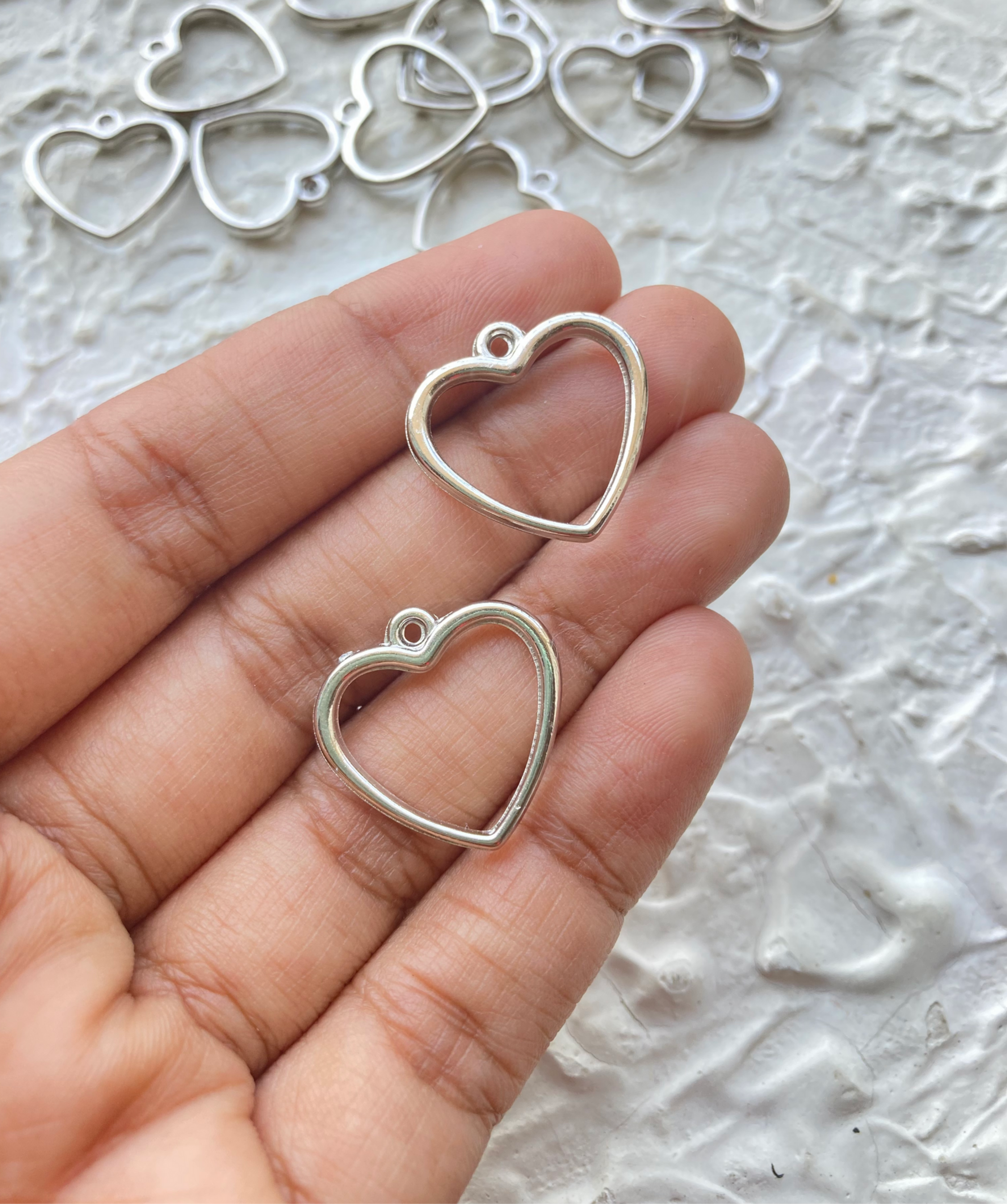 Plastic platinum heart charm/bezel