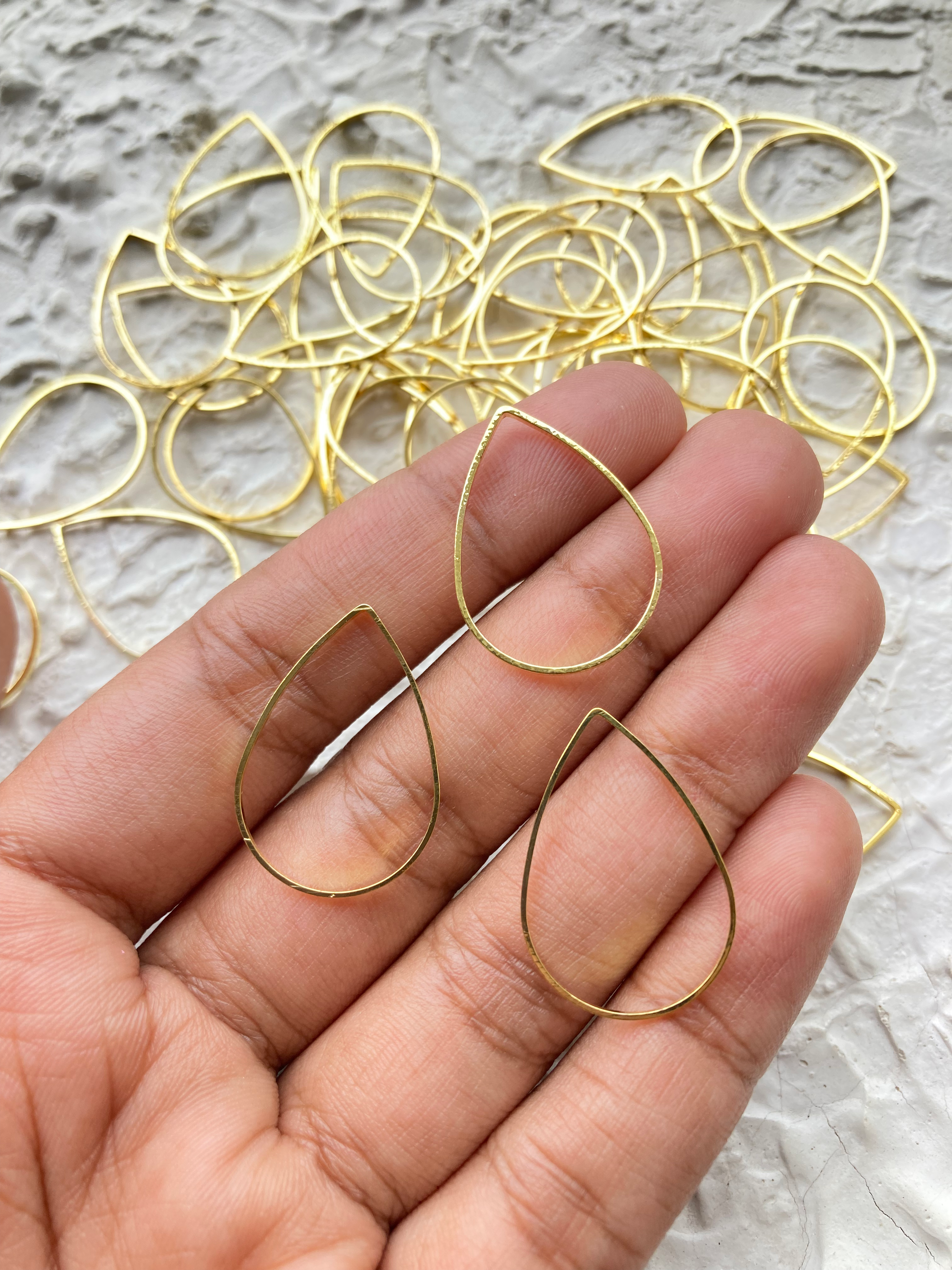 Gold colour teardrop brass bezel