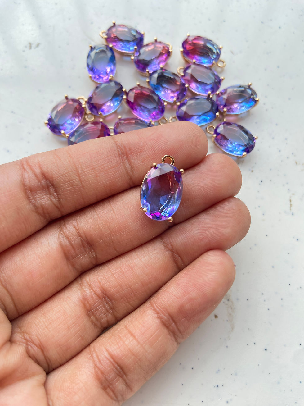 Thumbnail: Faceted dual colour oval glass charm