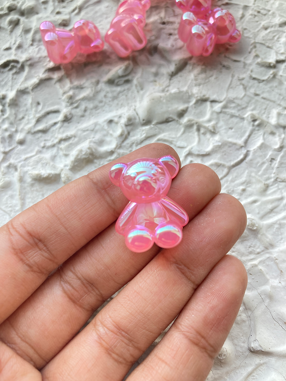 Thumbnail: Iridescent teddy cabachon charm