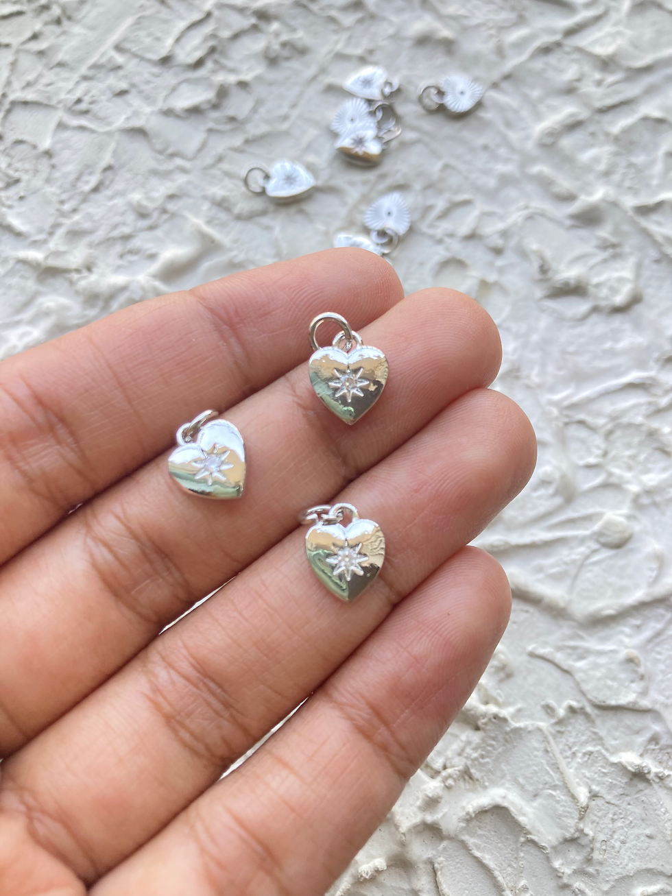 Thumbnail: PLatinum plated heart with zircon in middle charm